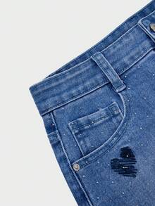 GlowEve Jupe mini en jean avec poche en biais, décoration de strass et broderie en forme de cœur pour femmes - Bleu azur - Voir 3