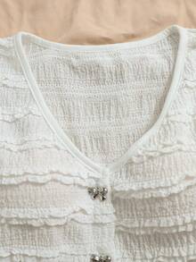 GlowEve 女士度假针织白色纹理V领T恤，精致蝴蝶结金属纽扣前开衩修身款，适合派对、嘉年华、下午茶、夏季休闲等场合 - 白色 - 查看 7