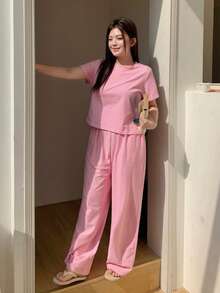 Dazy Plus Bộ đồ ngủ dệt kim 2 món, áo thun cổ tròn kẻ sọc ôm sát và quần dài rộng, màu hồng, thích hợp cho mùa xuân/hè. - Hồng - Xem 5