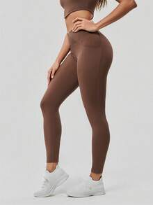 OutZeal 女士吸汗中度压缩交叉腰侧口袋紧身裤，适合日常健身和普拉提 - 棕色 - 查看 6