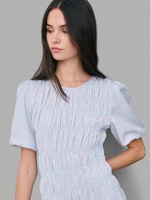 Nöista This Light Blue Striped Dress, Puff Sleeves, A Ruched Bodice With Smocking Details, And A Flowing Asymmetrical Shape. Women, Spring, Summer Outfit. - Blue - View 6