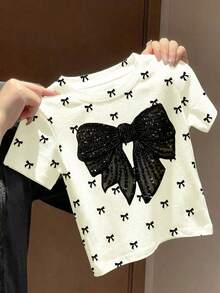SHEIN 女婴可爱芭蕾舞风格迷你蝴蝶结印花，优雅黑色蝴蝶结图案，时尚简约休闲短袖圆领上衣，适合夏季穿着，可爱夏日，夏季单品，夏季外出必备，韩版风格，返校季，轻松舒适又时尚，春夏休闲装，印花上衣，夏季新款，春夏时尚 - 彩色 - 查看 3