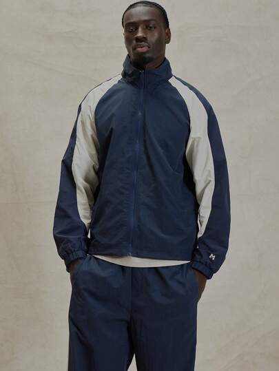 Musero Curved Panel Long Sleeve Nylon Zip Through Top Branded Cuff Detailing Bungee Cords Jacket Spring Summer Essentials