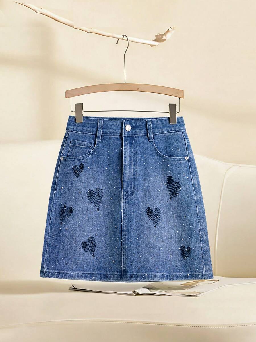 GlowEve Jupe mini en jean avec poche en biais, décoration de strass et broderie en forme de cœur pour femmes - Bleu azur - Voir 1