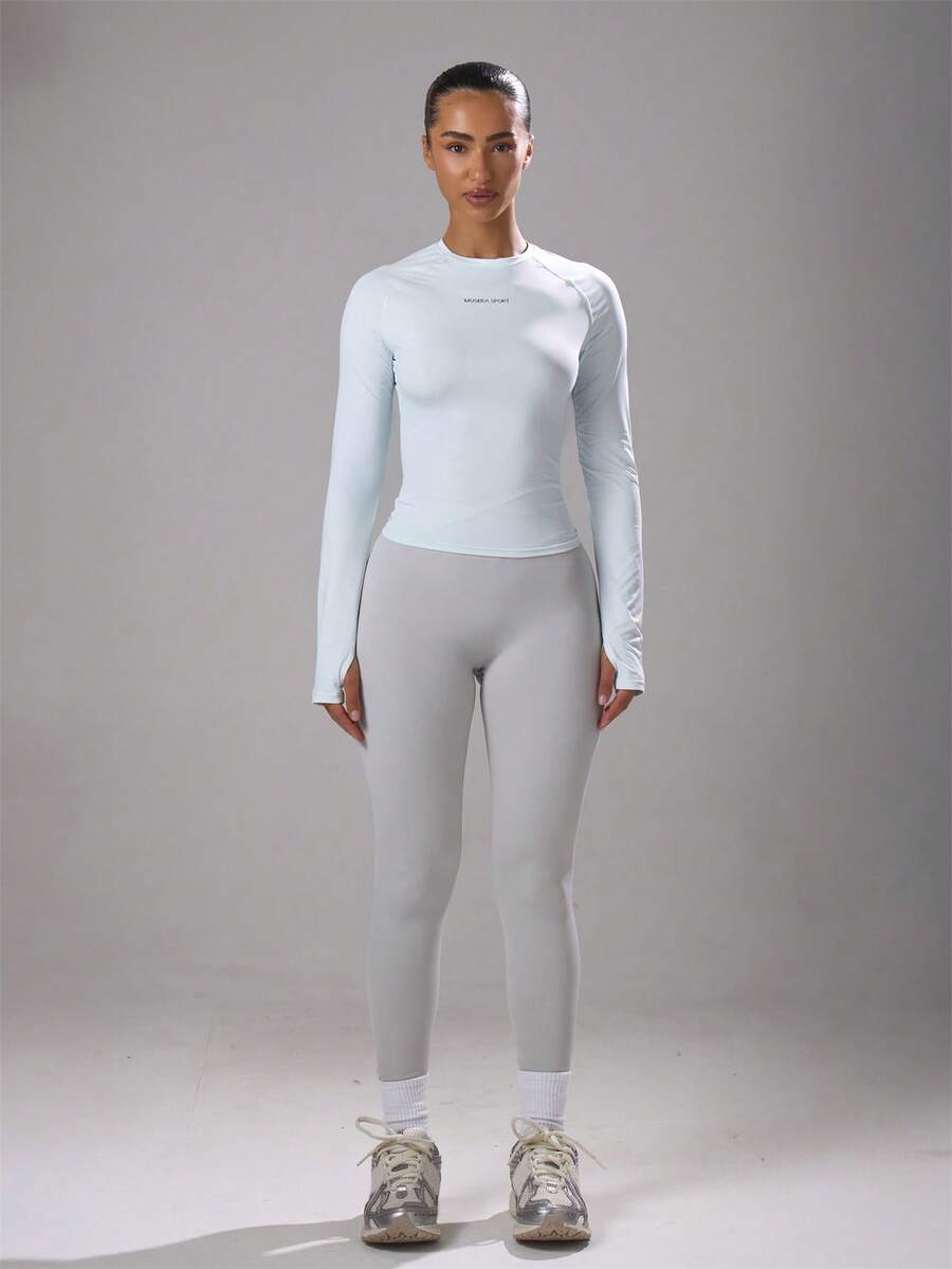 Musera Sport Áo thể thao tay dài ôm sát, có lỗ xỏ ngón tay cái, thích hợp cho Padel, Tennis, Pickleball và tập gym. - Màu xanh nhạt - Xem 1