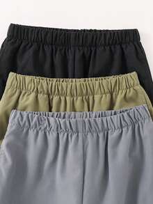 SHEIN Quần cargo dáng rộng, cạp chun, in chữ cho bé trai tuổi teen - Nhiều màu - Xem 7