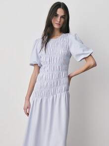 Nöista This Light Blue Striped Dress, Puff Sleeves, A Ruched Bodice With Smocking Details, And A Flowing Asymmetrical Shape. Women, Spring, Summer Outfit. - Blue - View 5