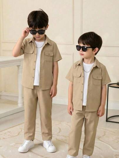 SHEIN 2pcs Boys Casual Solid Color Chest Pocket Short Sleeve Shirt And Elastic Waist Pants Set, Suitable For Autumn, Spring, Summer, Suitable For Outdoor Play, School, Street Photography, Party And Leisure