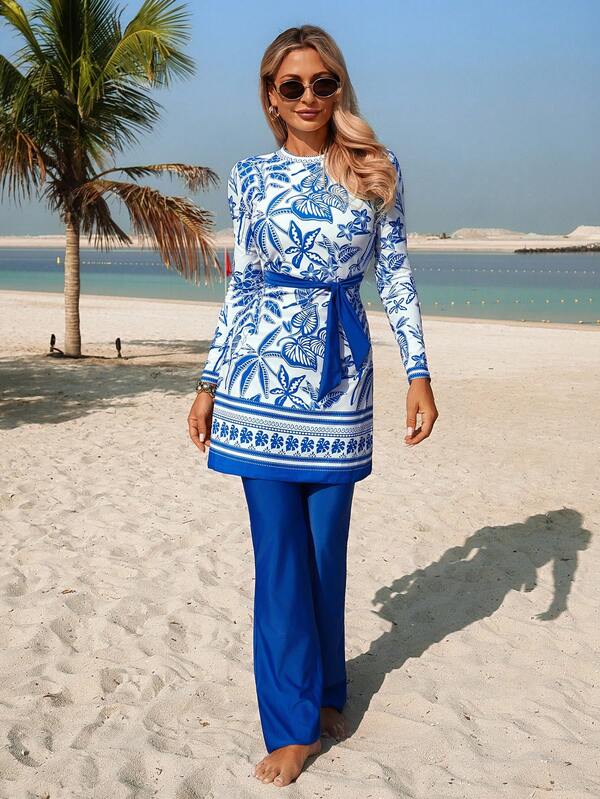 Swim Mulvari Women's Burkini Set, Fashionable Printed Tie-Front Crop Top And Solid Color Flare Pants, Suitable For Beach, Vacation, Casual, Recreation, & Popular Blue Two Piece Set Women Blue And White Outfit Women Resort Outfits For Women Blue Beach Outfit Mediterranean Style Clothes