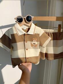 SHEIN 两件套男女通用婴儿服装，可爱夏季针织条纹卡通熊印花短袖T恤和松紧腰短裤，适合生日派对、锐舞派对、晚宴、演出、婚礼、宝宝满月、洗礼、一周岁生日庆祝、婚礼宾客、迎婴派对等场合。 - 彩色 - 查看 9