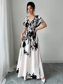 Elenzga V领收腰印花长裙，优雅迷人，适合春夏、秋冬四季穿着，也可作为音乐会、晚礼服、日常通勤、婚礼季/音乐节等场合的礼服。 - 黑與白 - 查看 5