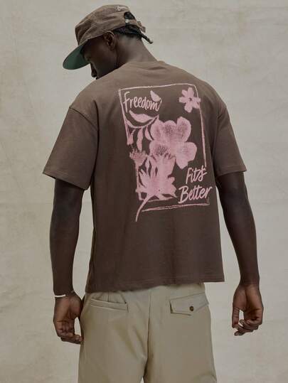 Musero Camiseta de cuello redondo de manga corta con hombros caídos, estampado gráfico y detalles de parche, esencial para primavera y verano