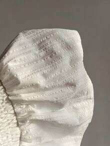 Elamini Chân váy xếp ly ngắn cạp thấp có dây rút, thêu lỗ khuy dành cho nữ - trắng - Xem 5