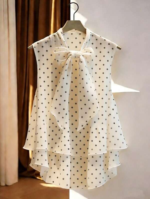 GlowEve Women's Polka Dot Print Tie Collar Ruffle Hem Sleeveless Blouse