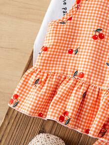 Sparklyn Conjunto informal de camiseta de tirantes con volantes y shorts con estampado de cerezas a cuadros para niña - Naranja - Ver 8