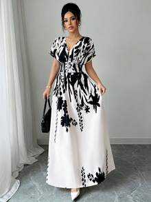 Elenzga V领收腰印花长裙，优雅迷人，适合春夏、秋冬四季穿着，也可作为音乐会、晚礼服、日常通勤、婚礼季/音乐节等场合的礼服。 - 黑與白 - 查看 4