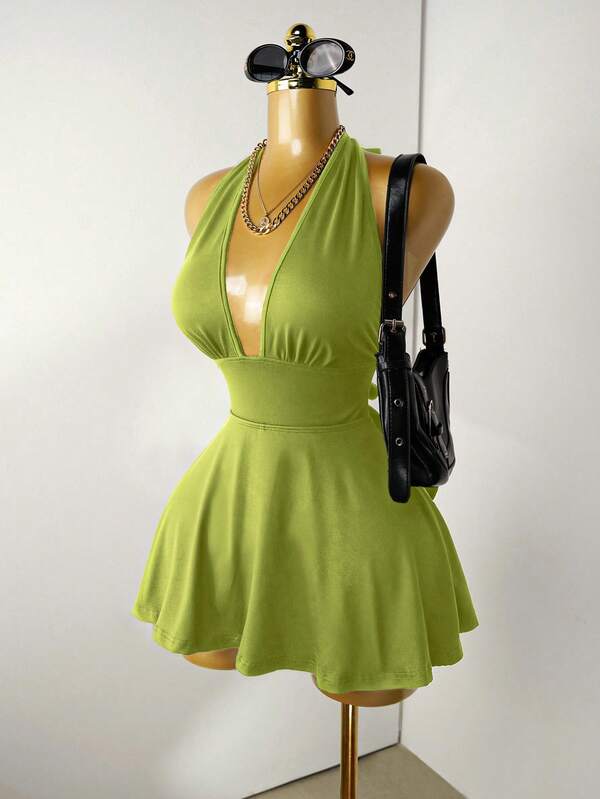 Mistrie Black Tight-Fitting Romper With Deep V-Neck, Backless Strap