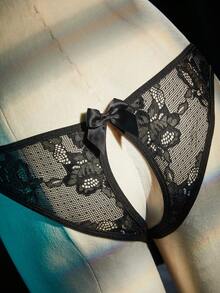 SpicyHot Bộ jumpsuit quyến rũ với chất liệu ren hoa rỗng tinh tế kết hợp cùng nơ satin trang trí, cùng áo ngực chữ V khoét sâu có gọng nâng ngực giúp tôn lên vòng eo, và dây đeo chéo có thể điều chỉnh, thiết kế hở lưng. - màu đen - Xem 3