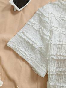 GlowEve 女士度假针织白色纹理V领T恤，精致蝴蝶结金属纽扣前开衩修身款，适合派对、嘉年华、下午茶、夏季休闲等场合 - 白色 - 查看 4