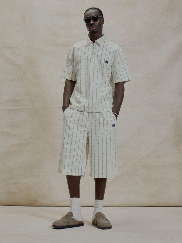 Musero Pantalones cortos de estilo Jort con estampado de marca en toda la prenda, de corte recto y longitud larga, esenciales de primavera y verano