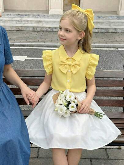 SHEIN Áo sơ mi ngắn tay kiểu dáng thường ngày có nơ trang trí dành cho bé gái, thích hợp cho mùa xuân/hè.