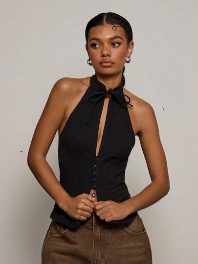 COUREZ Sleeveless Halter Neck Top With Front Cut Out And Tie Detail /Y2K Spring Clothes For Women Cute Sexy Going Out Tops Black Tops Music Festival Outfits Summer Tops