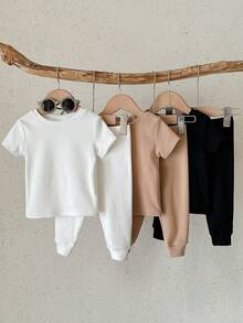 SHEIN 3件套男女宝宝通用柔软舒适纯色基础款贴身睡衣套装，包括短袖T恤和长裤 - 彩色 - 查看 3