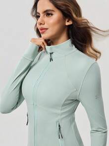 OutZeal Giacca sportiva da donna, colore unito, per allenamento, palestra, yoga, asciugatura rapida, aderente, con collo alto, chiusura lampo, top attivo, adatta per estate e primavera - Verde - Visualizzare 11
