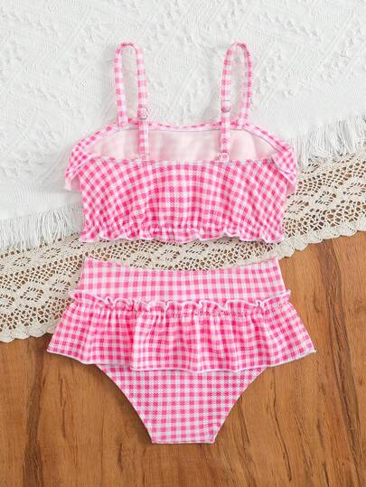 SHEIN Bộ bikini cho bé gái, bộ đồ bơi xếp ly họa tiết kẻ caro hồng ngọt ngào - Kiểu bikini hai mảnh với áo xếp ly nhiều lớp và quần bơi có váy cùng màu, hoàn hảo cho những ngày đi biển, tiệc bể bơi và kỳ nghỉ hè. Chất liệu siêu mềm, nhanh khô và co giãn đảm bảo sự thoải mái cả ngày và tự do vận động cho công chúa nhỏ của bạn. Bikini viền xếp ly cho bé gái, đồ bơi hai mảnh, bộ bikini kẻ caro xếp ly cho trẻ em, đồ bơi hai mảnh dệt kim xếp ly cho bé gái 8 tuổi, hai mảnh có xếp ly, bộ đồ bơi hai mảnh dệt kim cổ xếp ly cho bé gái, áo bikini và quần bơi, đồ bơi hai mảnh xếp ly cho bé gái, bộ bikini xếp ly màu hồng kẻ caro.