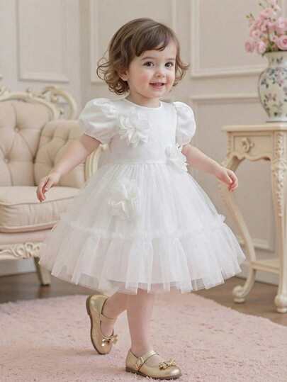 Souflis Souflis 2026 New Summer Baby Girls' Dreamy White Mesh Princess Dress, Pure White Tone With 3D Floral Decor, Puff Sleeve Design For Soft Cuteness, Multi-Layer Mesh Skirt For Fluffy Dynamics, Showcasing Gentle Princess Vibe, Snap Button Closure At Back For Easy Wear, Suitable For Daily Outings, Parent-Child Photos, 100-Day Celebration, Birthday Party, Wedding Flower Girl And More
