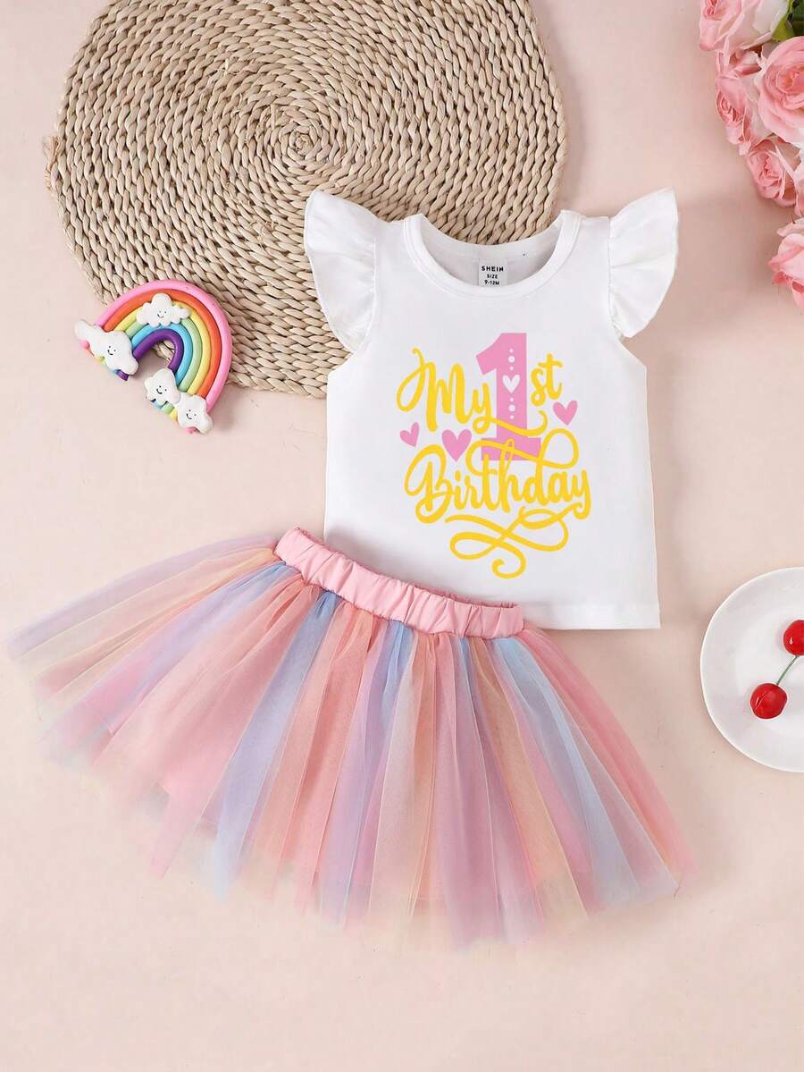 SHEIN Playful Pals Set de 2 piezas Conjunto de niña bebé "Mi primer cumpleaños" con estampado, camiseta de cuello redondo y manga con volantes, combinada con falda de tul arcoíris, adecuado para salidas de verano - Blanco - Ver 1
