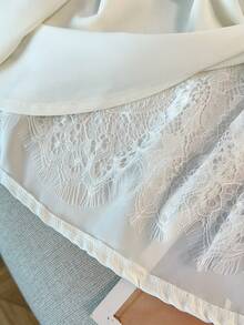 GlowEve CURVE Blouse élégante à manches longues et col rond pour femmes grandes tailles avec dos en dentelle et design torsadé, idéale pour les sorties et les rendez-vous - Blanc - Voir 6