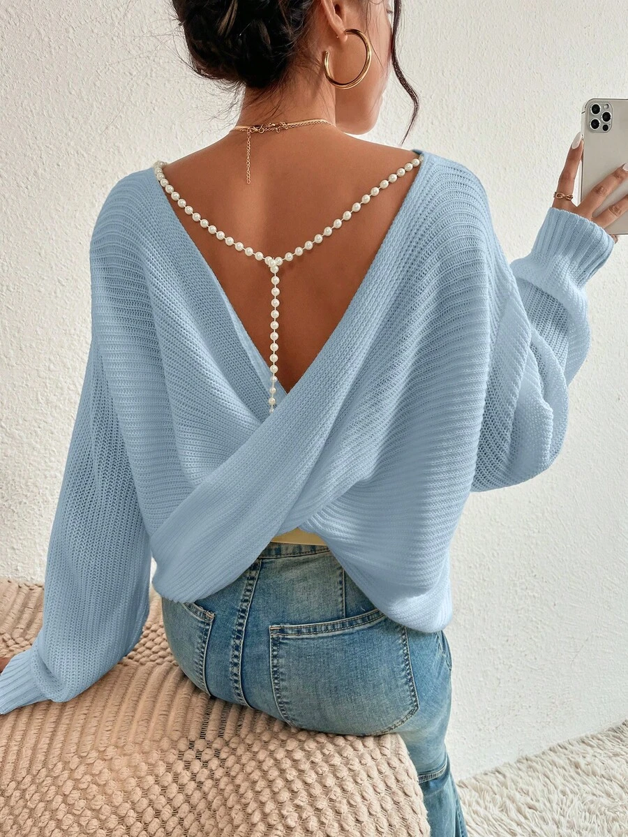 EURMUSE Women's Solid Color Loose Fit Dropped Shoulder Long Sleeve Criss-Cross Back Sweater, Autumn/Winter - Baby Blue - View 1