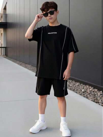 Vacaura 2件套青少年男童休闲黑色短袖T恤和短裤套装，点状印花装饰，适合夏季户外活动