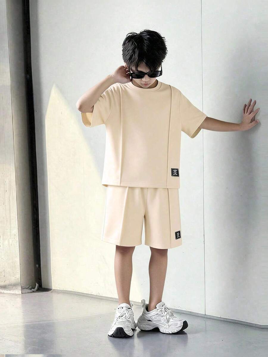 SHEIN Mirajuku Tween Boy Basic Solid Color Deconstructed Short Sleeve T-Shirt And Shorts Set, Suitable For Casual And Sports Wear - Apricot - View 1