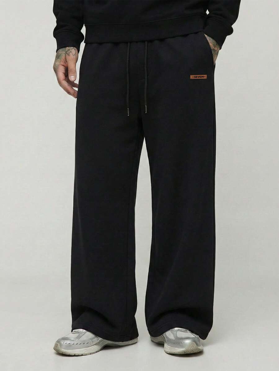 Manfinity Hypemode Men's Casual Everyday Loose Fit Drawstring Waist Pants With Slant Pockets Men Baggy Wide Pants Mens Loose Pants Men Wide Leg Pants The Chic Edit Happy New Year 2026 Pants For Men,Baggy Pants - Black - View 1