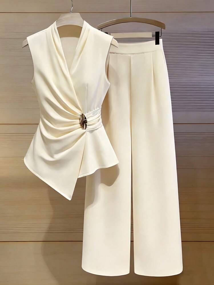 Franclia Completo elegante da donna, primavera/estate 2026, pantaloni lunghi con bottoni metallici asimmetrici senza maniche e arricciature, 2 pezzi - Albicocca - Visualizzare 1