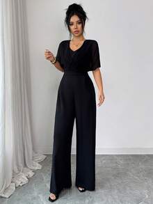 Elenzga 新款轻盈雪纺纯色短袖连体裤，V领设计，侧边口袋，喇叭袖，阔腿剪裁，优雅时尚，是春夏休闲穿搭的理想之选。黑色连体裤，优雅阔腿连体裤，女士连体裤套装，黑色连体裤，女士连体裤，优雅连体裤 - 黑色 - 查看 6