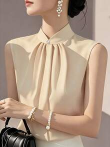 Almamuse Áo sơ mi nữ không tay cổ tàu xếp ly màu trơn, thời trang và đa năng, phù hợp cho đi làm và đi chơi. - Rượu sâm banh - Xem 1