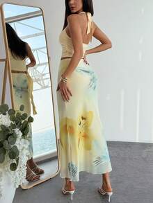 Aloruh Trang phục nghỉ hè cho nữ: Áo crop top cổ xếp ly in họa tiết hoa nhiệt đới và chân váy đuôi cá xếp tầng gợi cảm. Đồ đi biển mùa hè, trang phục nghỉ mát biển cho nữ, trang phục nghỉ mát nhiệt đới phong cách Bohemian cho nữ, đồ đi biển lưới hoa cho nữ, bộ đồ in hoa màu vàng, trang phục nghỉ mát nhiệt đới cho nữ, bộ đồ mùa hè. - Vàng nhạt - Xem 2