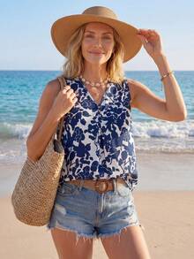 Sylviya Camisa Primavera Sin Mangas Con Cuello En V Y Diseño Floral En Azul Sobre Base Blanca Para Mujer - Blanco y Negro - Ver 1