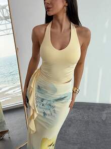 Aloruh Trang phục nghỉ hè cho nữ: Áo crop top cổ xếp ly in họa tiết hoa nhiệt đới và chân váy đuôi cá xếp tầng gợi cảm. Đồ đi biển mùa hè, trang phục nghỉ mát biển cho nữ, trang phục nghỉ mát nhiệt đới phong cách Bohemian cho nữ, đồ đi biển lưới hoa cho nữ, bộ đồ in hoa màu vàng, trang phục nghỉ mát nhiệt đới cho nữ, bộ đồ mùa hè. - Vàng nhạt - Xem 3