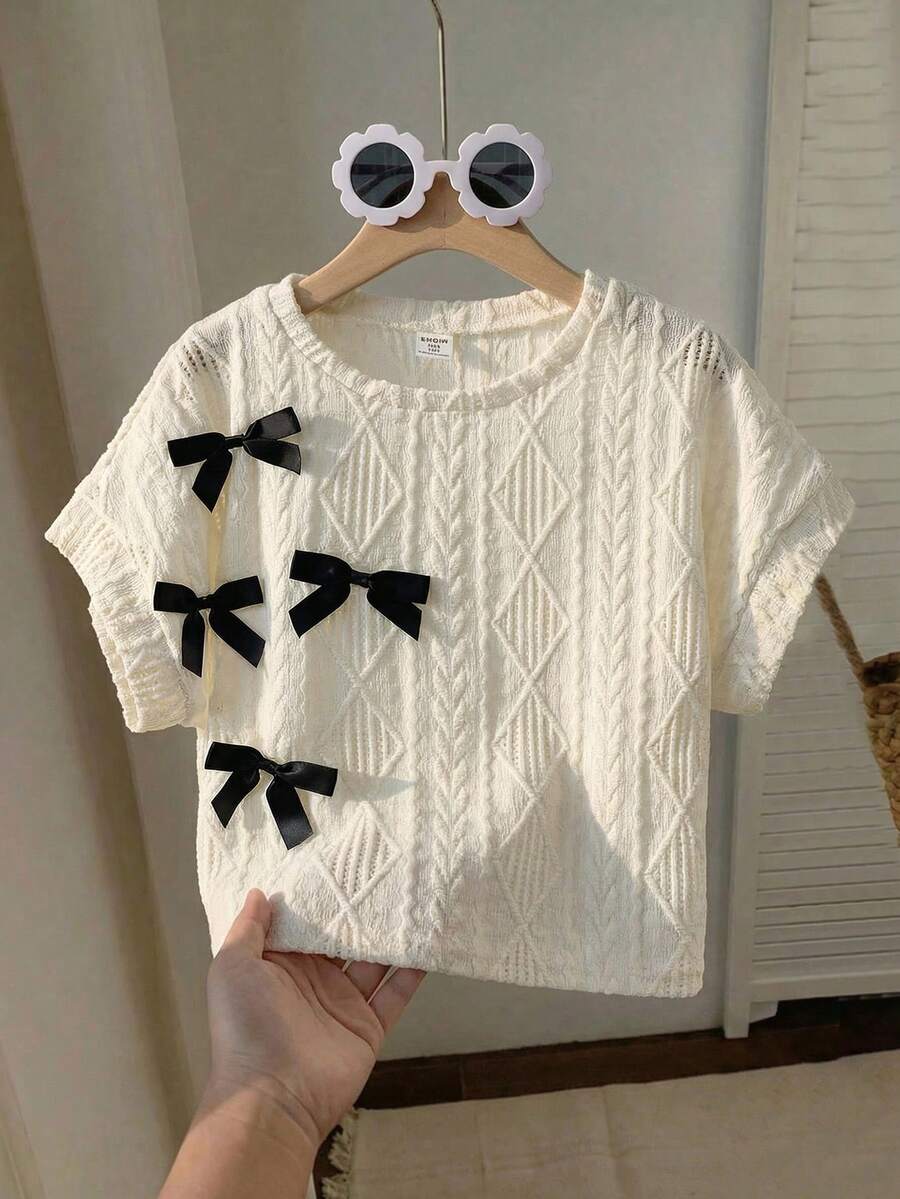 SHEIN LMoss Tween Girls Loose Fit Crew Neck Colorblock Black Ribbon Bow Decor Textured Fabric Short Sleeve Crop Top - Beige - View 1