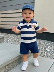 Souflis Souflis Bộ áo thun polo tay ngắn và quần short họa tiết gấu thêu dễ thương cho bé trai sơ sinh, thích hợp cho mùa hè - Hải quân - Xem 5