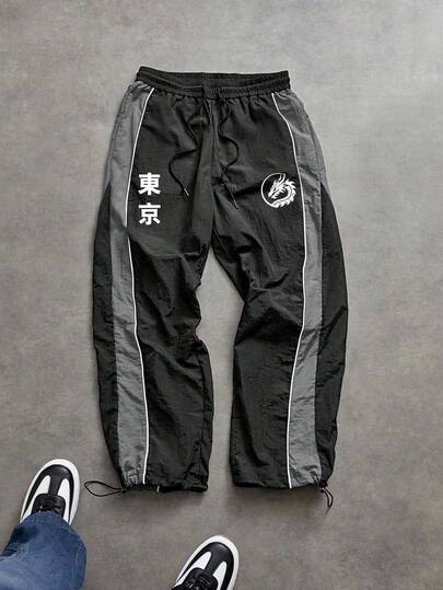 Sport MetroGents Pantalones deportivos casuales de moda para hombres con estampado de texto de dragón, ribete de contraste y cordón en la cintura