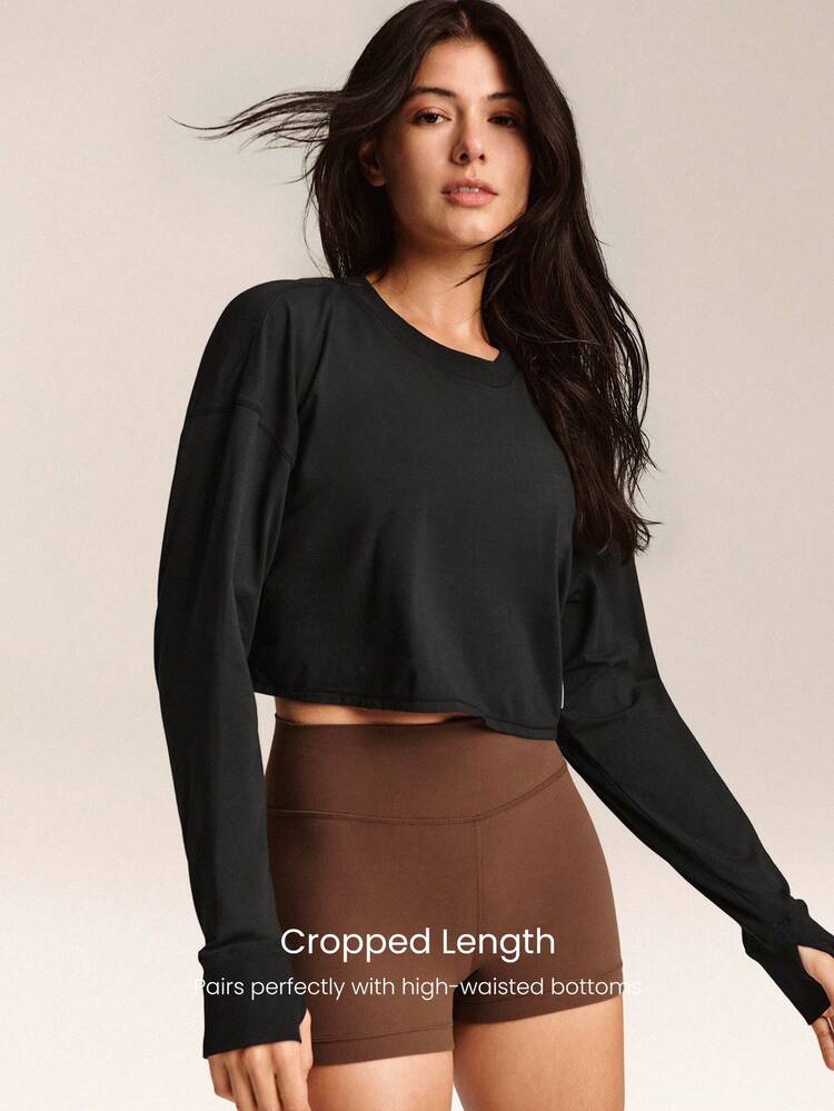 Top corto de manga larga de algodón pima con cuello y puños acanalados, solapa trasera superpuesta, transpirable y elástico, para gimnasio, estudio, entrenamiento y uso diario casual