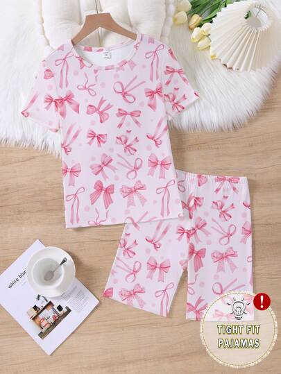 2件套女童时尚简约浅粉色底多蝴蝶结印花圆领针织紧身舒适休闲短袖上衣和短裤睡衣套装