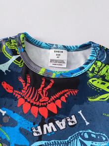 Conjunto de pijama de manga corta ajustado que brilla en la oscuridad con gráfico de dinosaurio y neón para niño pequeño, estampado aleatorio - Multicolor - Ver 7