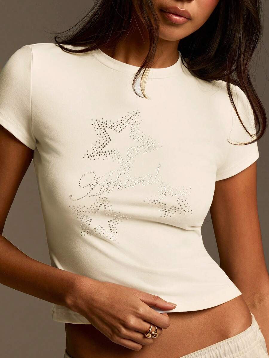 Athîral 女士圆领水钻星星图案休闲百搭通勤短袖T恤，水钻星星图案露脐上衣，修身版型，采用柔软舒适的针织面料，适合休闲夏季度假、假日和海滩穿着。 - 黃色 - 查看 1