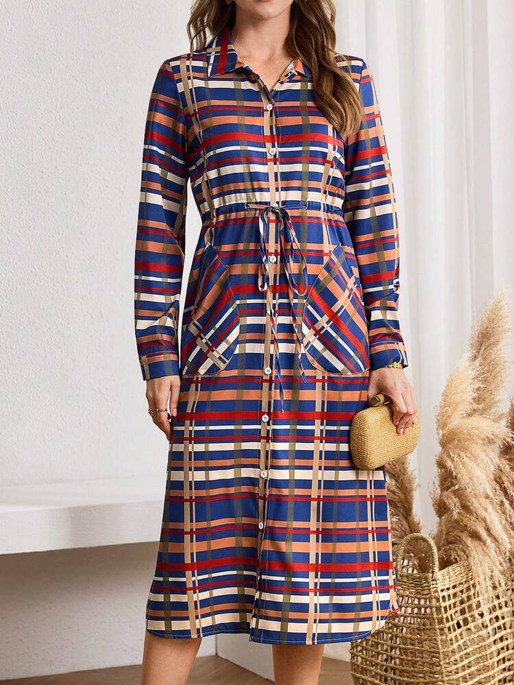 This Elegant Women's Spring/Summer Dress Features A Navy Blue Base With Contrasting Red, Brown, And White Plaid Patterns, Creating A Retro Yet Vibrant Look. The Classic Plaid Pattern Adds A Touch Of Vintage Style. The Long-Sleeved Shirt Style With A Drawstring Waist And A Crisp Collar Adds A Touch Of Casual Elegance. Perfect For Spring And Autumn, This Dress Is Suitable For Both Casual Outings And Light Commutes. The Plaid Pattern Conveys A Retro Feel While The Fitted Waist Showcases A Relaxed And Stylish Look, Making It A Versatile And Practical Addition To Any Wardrobe.